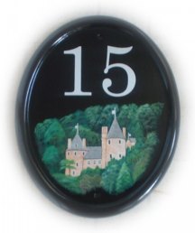Castle Coch sign - A historic castle in Wales, painted on a large classic oval plauque.