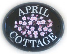 Cherry Blossom spray - painted by Gerry on a large classic oval sign base. Font is called Century Schoolbook