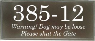 Black two line classic rectangle house plaque with Century Schoolbook font - the numbers are standard, the text is in itallic