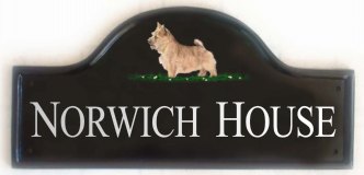 Norwich Terrier - Painted on a Large Mews plaque. Painted by Gerry, artwork taken from a Kennel Club book showing dog breeds. Font is called Times Roman with All Capital Letters with the first letter for each word larger than the rest.