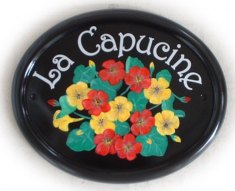 Nasturtiums - painted on a large classic oval house plaque by Gerry. Font is called Harrington