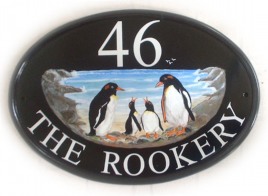 Penguin Family - Painted on a New World Classic Oval by Jean