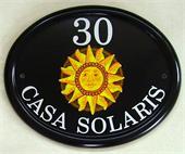 sun-motif-house-sign