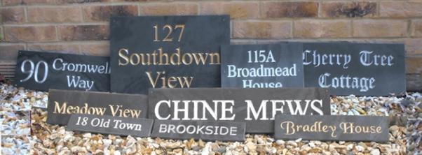 V-carved slate house signs